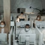 Masked Employees In Call Centre
